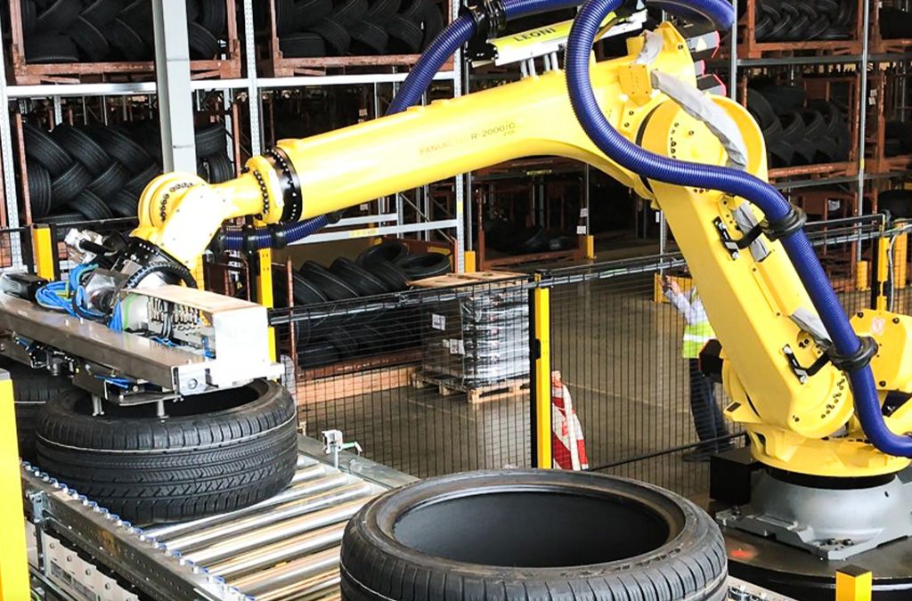 Robot-assisted tire palletizing